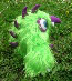 bright green shaggy fur monster (side view)