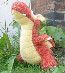 red plush baby dragon (picture shows the stitching detail on the belly) front view